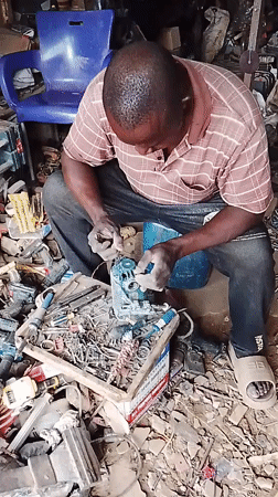 Alternator repair work underway in a busy Abuja workshop