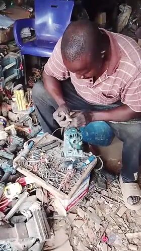 Alternator repair work underway in a busy Abuja workshop