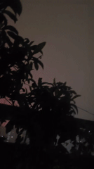 Lightning illuminates overcast sky in Yuzhong District, China