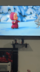 Masha and the Bear plays on TV in a Chardara home