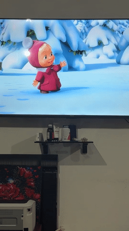 Masha and the Bear plays on TV in a Chardara home