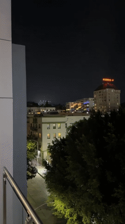 Hollywood Sign captured in nighttime footage from LA rooftop