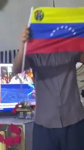 Man waves Venezuelan flag, captured in multiple moments in Juangriego