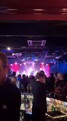 Live night at a Moscow club, disco ball spinning
