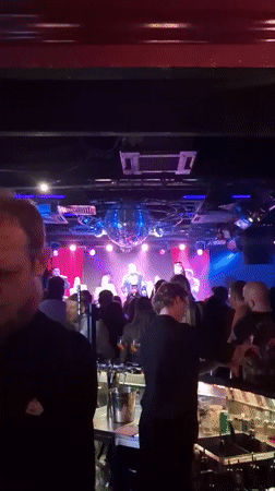 Live night at a Moscow club, disco ball spinning