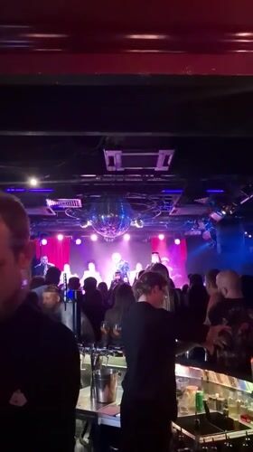 Live night at a Moscow club, disco ball spinning