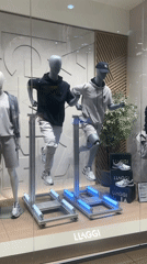 Athletic mannequins displayed in dynamic poses at Pleven store