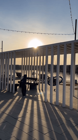 Peaceful waterfront moments captured in Zelenogorsk during afternoon sunlight