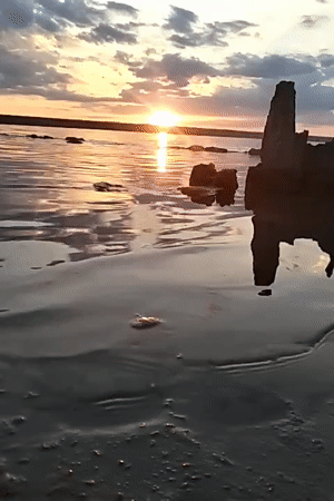 Sunset hour on Odesa's Black Sea shore, June 2026