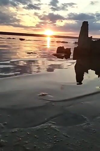 Sunset hour on Odesa's Black Sea shore, June 2026