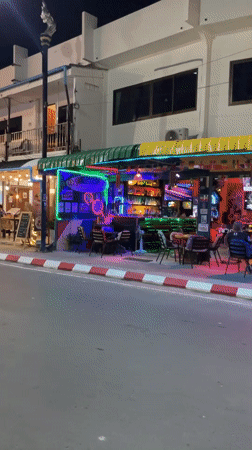 Evening street life documented in Karon, Thailand