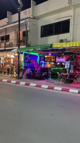 Evening street life documented in Karon, Thailand