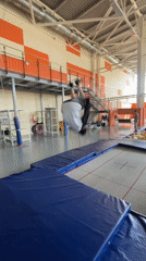 Boy performs trampoline backflip at Krasnoyarsk gymnasium