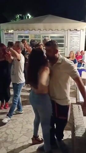 Evening dancing gathering captured at Zanzibar restaurant in Pineto
