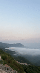 Dense fog blankets Lapčići's coastal valleys at dusk