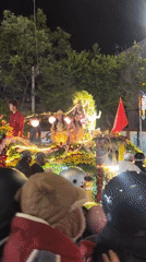 Ceremonial float with lotus symbols draws crowds in Da Lat