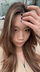Woman poses for outdoor photo in Chengguan District