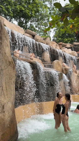 Poolside hangout at a Nha Trang resort with waterfalls