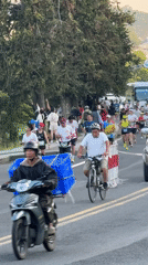 Marathon runners compete along lakeside streets in Da Lat