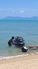 Jet ski loaded onto trailer on Ko Samui beach