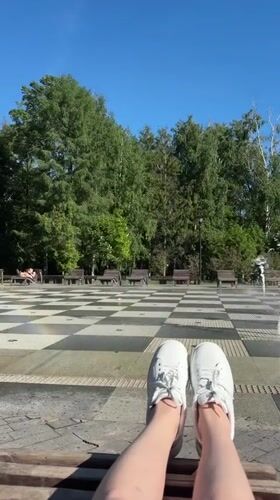 Person sits by decorative fountain in Kazan