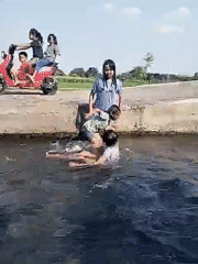 Kids swimming in a Nepen canal on a quiet morning