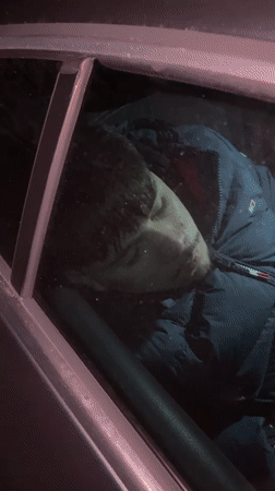 Person filmed sleeping in car backseat in Zlatograd