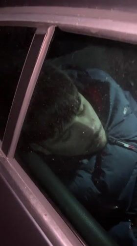 Person filmed sleeping in car backseat in Zlatograd