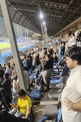 Soccer fans celebrate at Mumbai stadium during evening match
