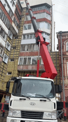Crane operation documented in Perm, Russia street scene