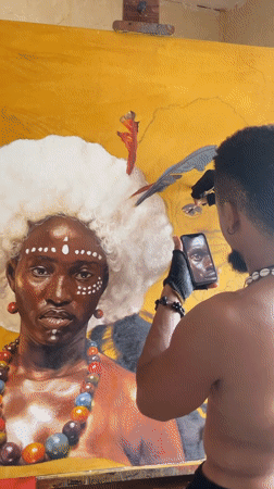 Artist creates portraits in Nigerian studio using phone references