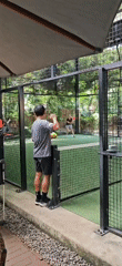 Early morning padel game documented in Denpasar, Indonesia