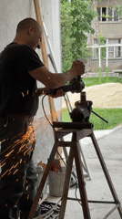 Worker grinds metal pipe in Kazanlak workshop