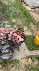 Backyard BBQ documented at wooden cabin in rural Bulgaria