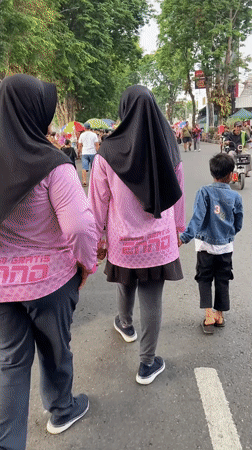 Street festival with market stalls and stage in Purwodadi