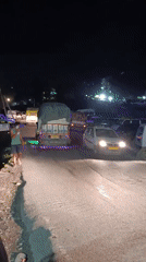 Night traffic and camping on the road through Palchan
