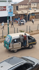 Evening street market activity captured across urban commercial district