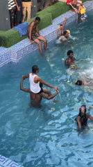 Swimming pool gathering draws crowds in Onitsha, Nigeria