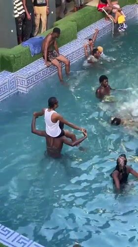 Swimming pool gathering draws crowds in Onitsha, Nigeria