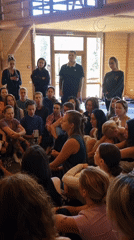 Morning wellness session in a wooden hall, Izky, Ukraine