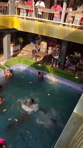 Pool party with floating money observed in Nkpor, Nigeria