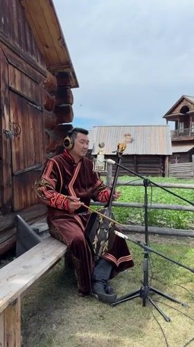 Traditional Mongolian music meets modern headphones in rural Russia