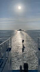 Ferry passenger captures sunny afternoon voyage near Keramoti, Greece