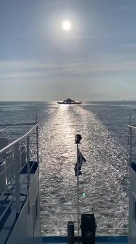 Ferry passenger captures sunny afternoon voyage near Keramoti, Greece