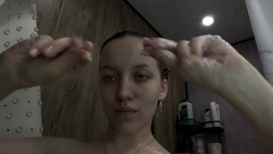 Woman's morning routine documented in Reshetnikovo bathroom