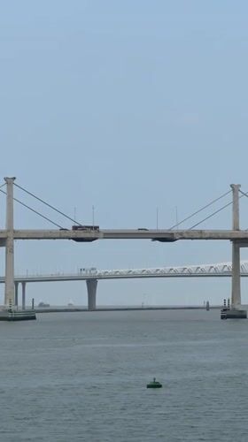 Morning harbor activity documented across Macau bridges and waterways