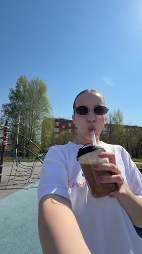 Mother and child enjoy morning playground visit in Reshetnikovo