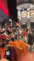 Madrid streets flood with Spanish flag-waving crowds in late-night celebration