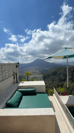 Balcony loungers overlooking Kintamani's mountain landscape