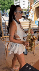 Live saxophone on a beachside deck in Sutomore